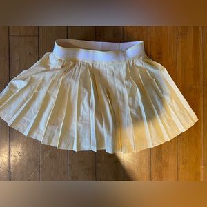 Yellow Athleta Girl pleat perfect skort size 12 (kids) Large
